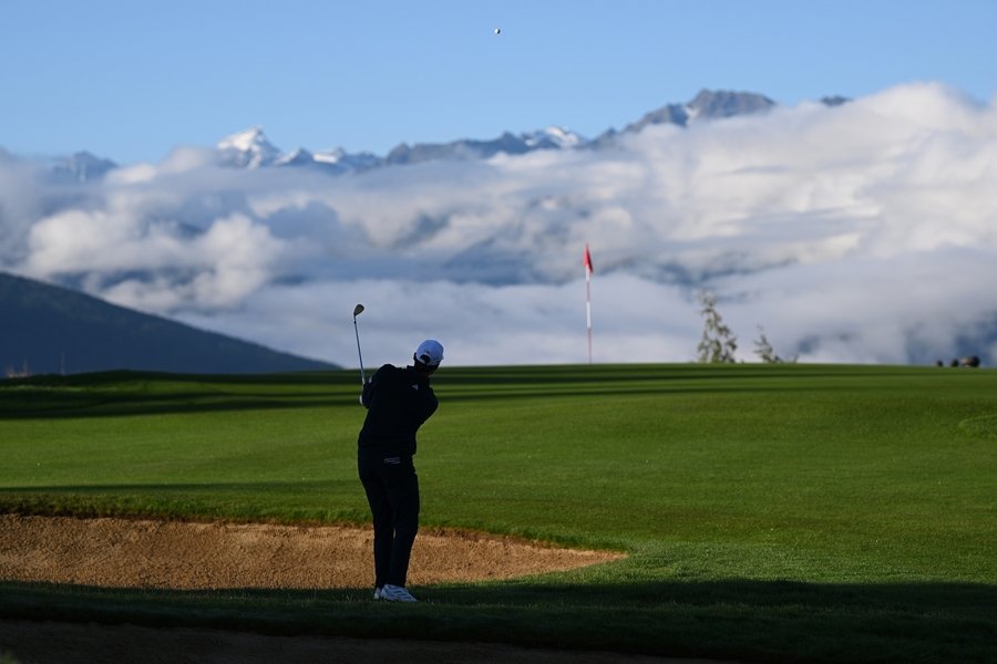 CRANS-MONTANA, SWITZERLAND - AUGUST 29: Rasmus Hojgaard of Denmark plays his second shot on the seventh hole on day two of the Omega European Masters 2025 at Crans-sur-Sierre Golf Club on August 29, 2025 in Crans-Montana, Switzerland. (Photo by Stuart Franklin/Getty Images)